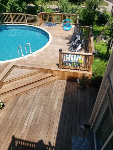 a balcony with furniture and garden