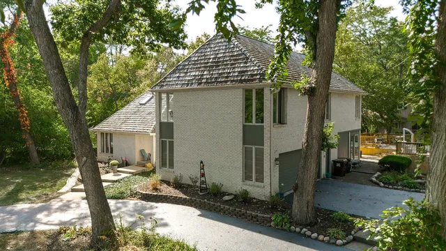 a view of swimming pool with seating area