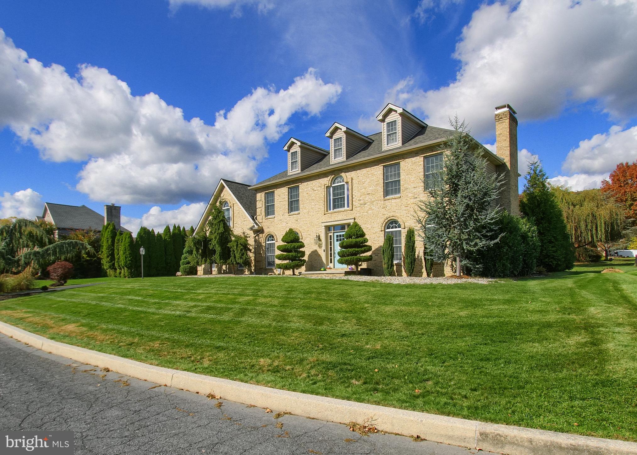 2302 Scarsborough Drive Harrisburg, PA 17112 - Photo 2 of 69 a front view of a house with a yard