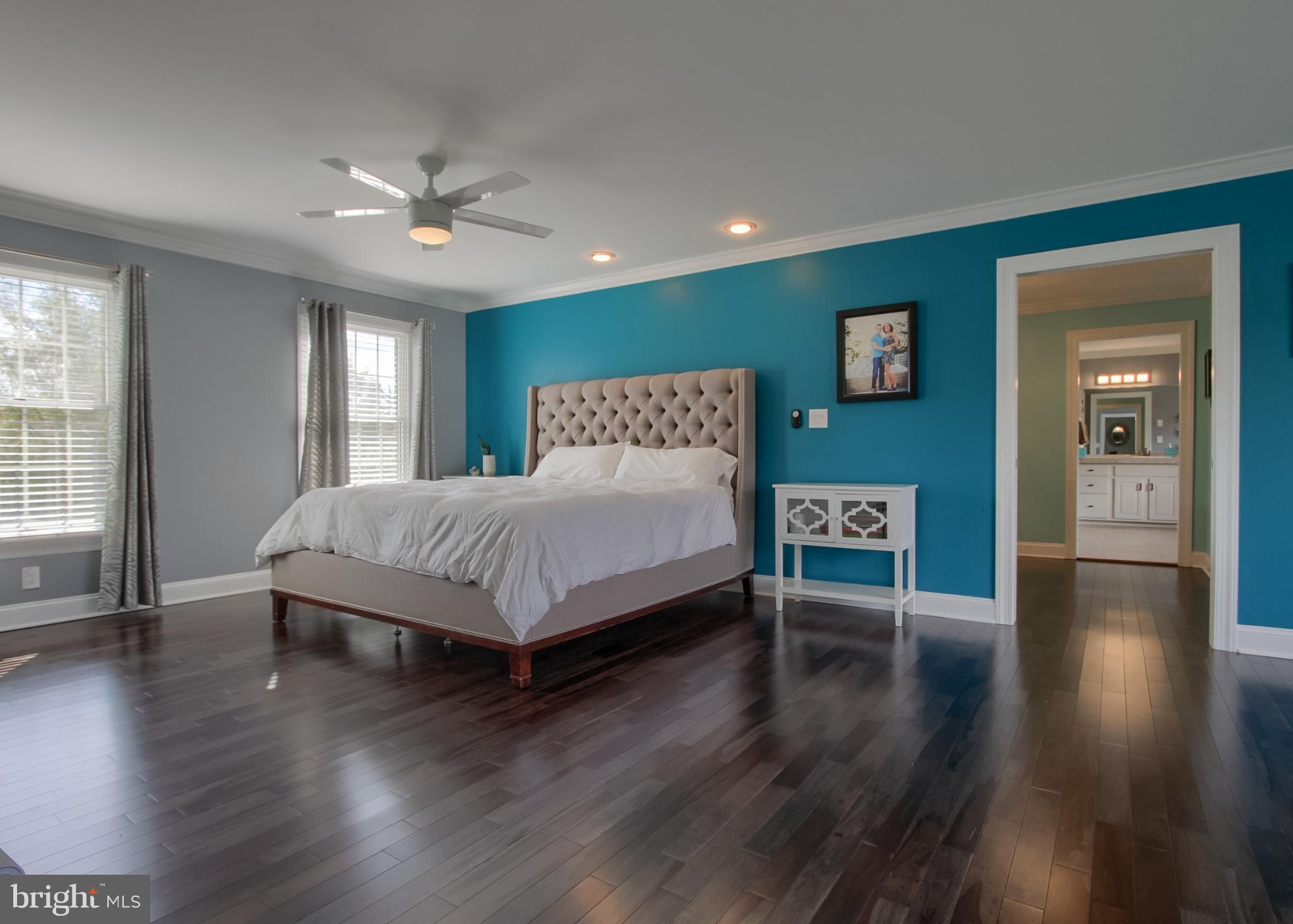 2302 Scarsborough Drive Harrisburg, PA 17112 - Photo 39 of 69 a spacious bedroom with a bed and a wooden floor