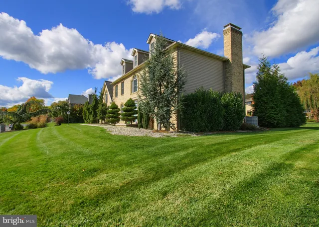 a view of patio with chairs and tables