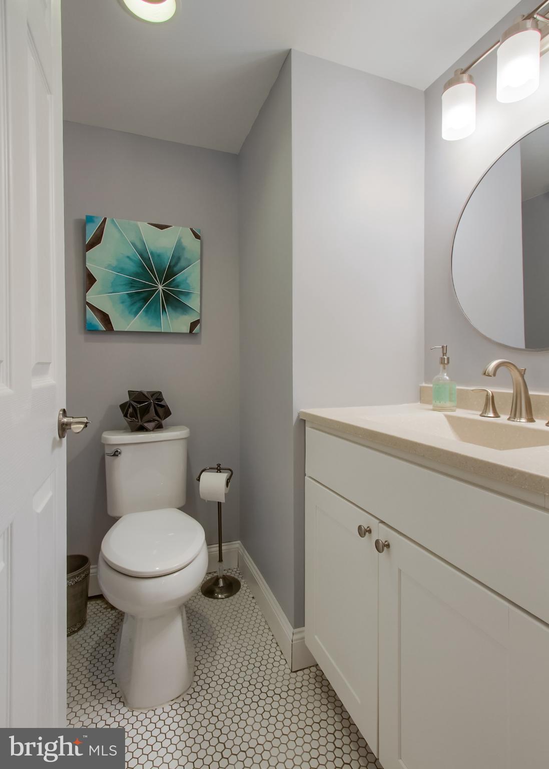 2302 Scarsborough Drive Harrisburg, PA 17112 - Photo 45 of 69 a bathroom with a sink toilet and a mirror