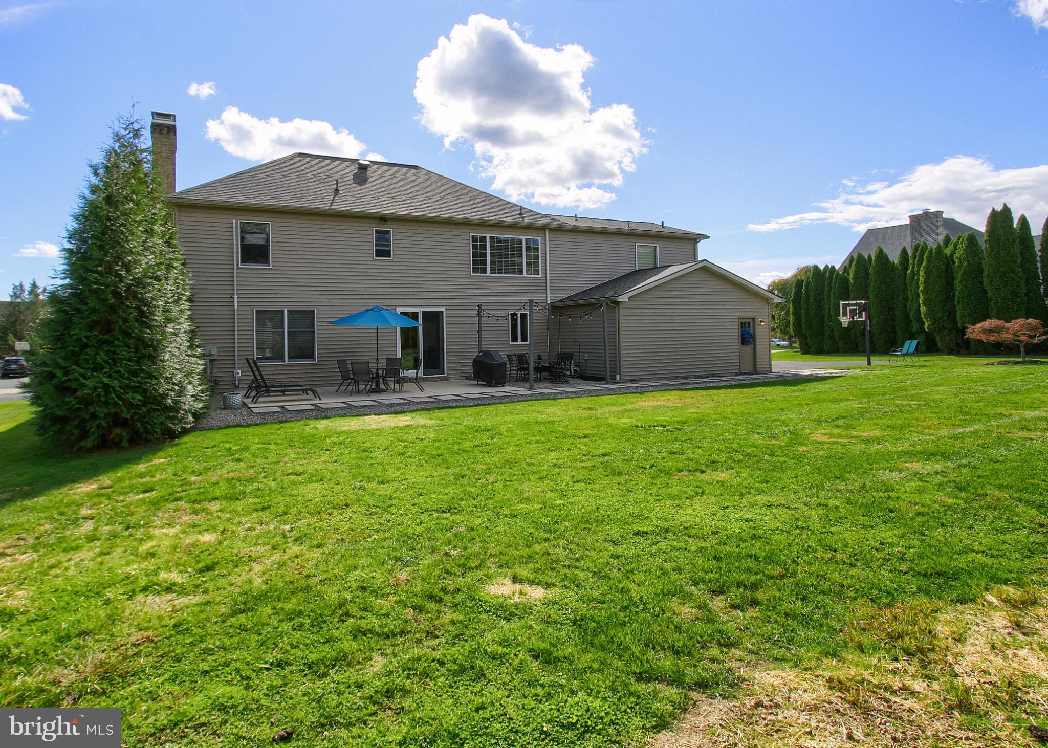 2302 Scarsborough Drive Harrisburg, PA 17112 - Photo 5 of 69 a front view of a house with patio yard and outdoor seating