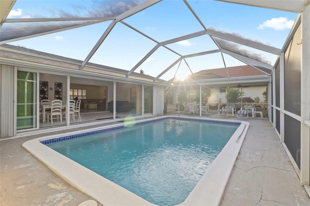 440 Darling Drive Venice, FL 34285 - Photo 30 of 74 an outdoor space with swimming pool and furniture