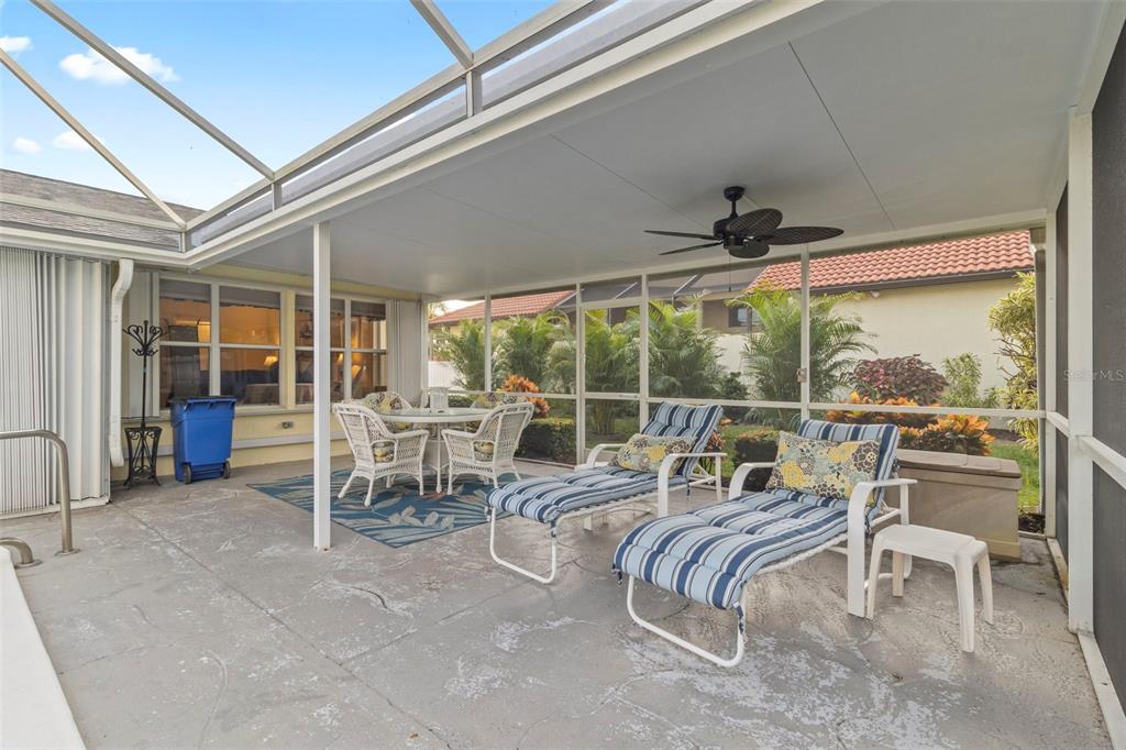 440 Darling Drive Venice, FL 34285 - Photo 31 of 74 a living room with furniture and large windows
