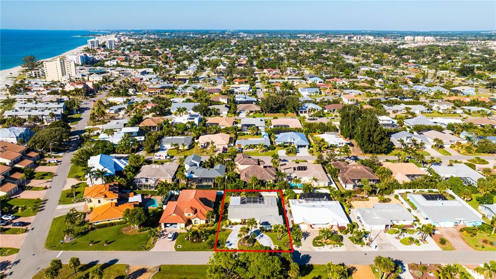 440 Darling Drive Venice, FL 34285 - Photo 44 of 74 an aerial view of residential building with parking space