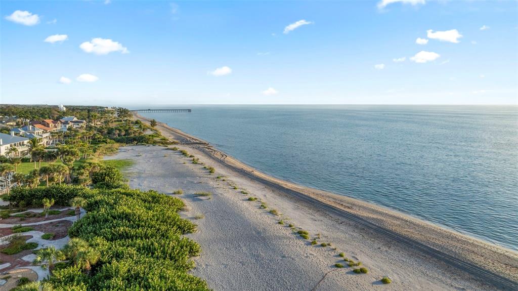 440 Darling Drive Venice, FL 34285 - Photo 47 of 74 a view of an ocean beach and mountain