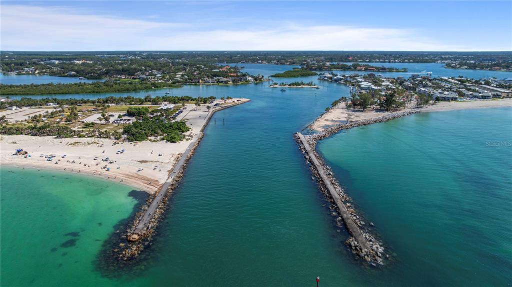 440 Darling Drive Venice, FL 34285 - Photo 60 of 74 an aerial view of a house with a yard and lake view