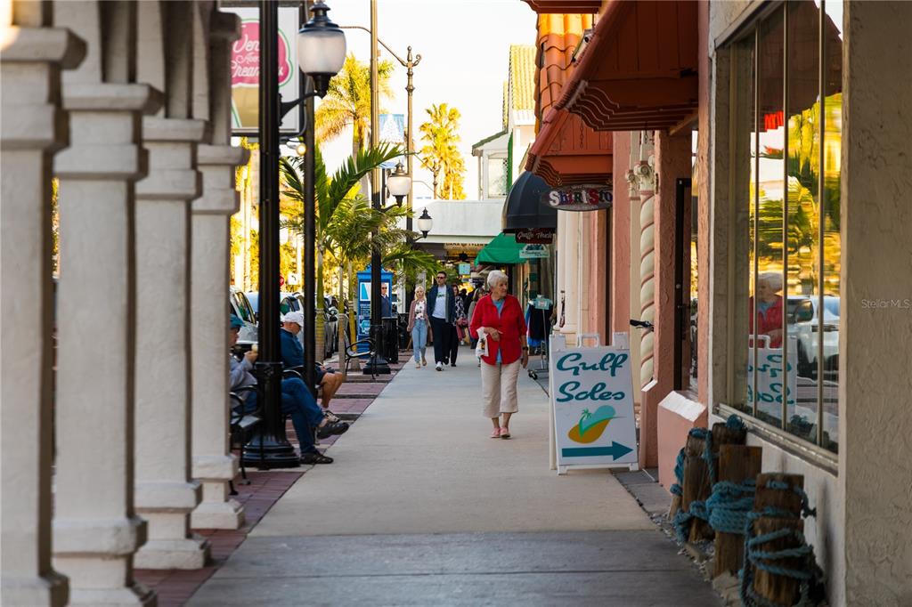 440 Darling Drive Venice, FL 34285 - Photo 65 of 74 a view of path along with retail shop and buildings