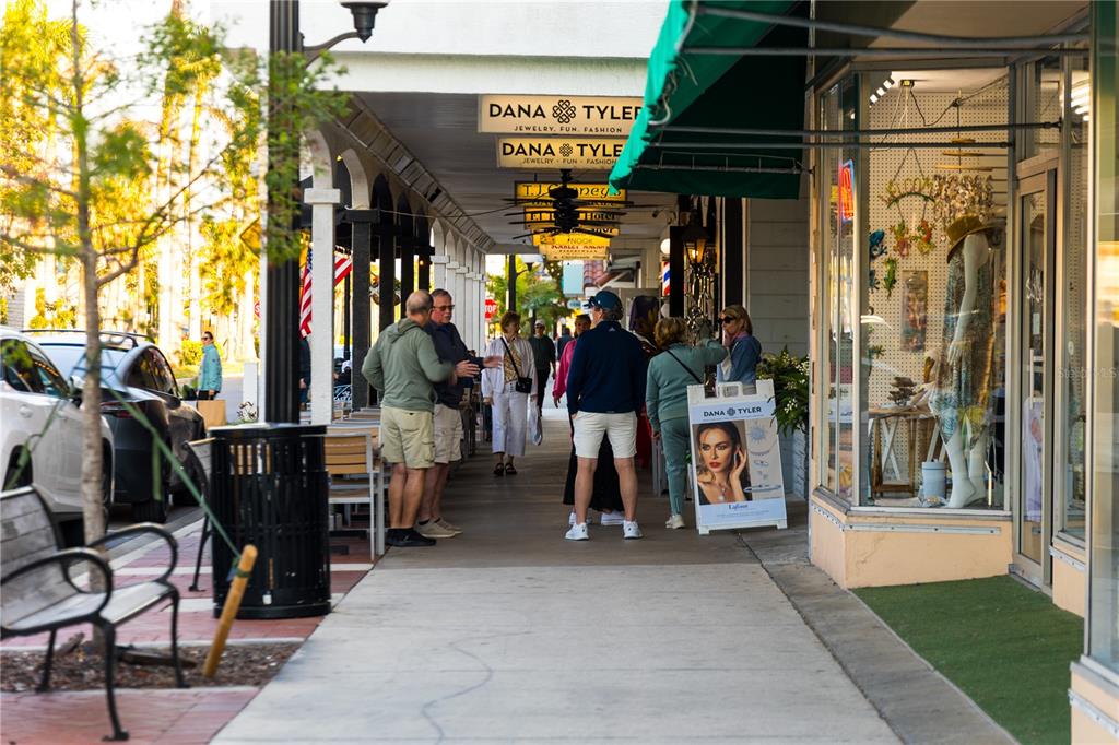 440 Darling Drive Venice, FL 34285 - Photo 66 of 74 a view of path along with retail shop and buildings