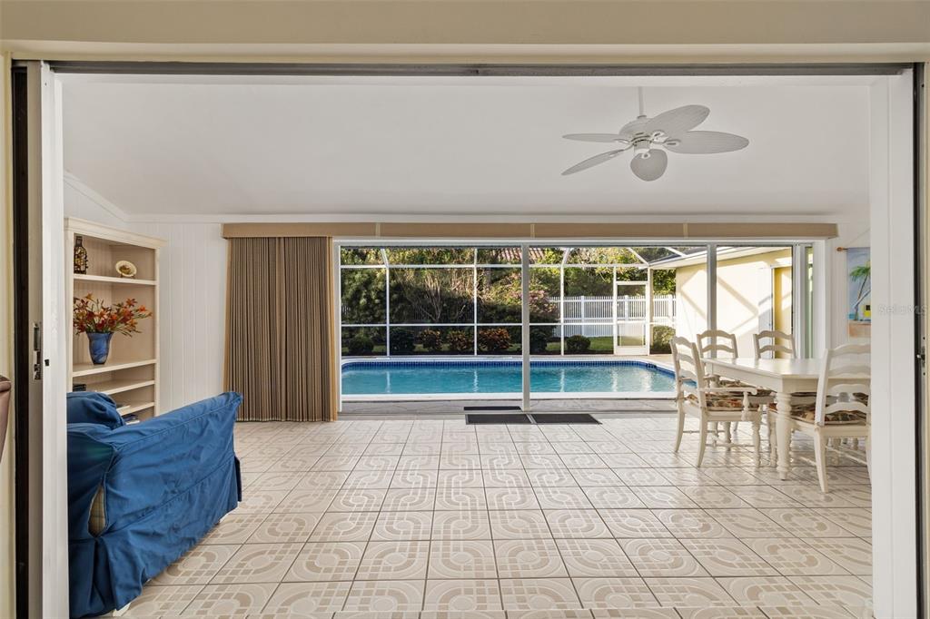 440 Darling Drive Venice, FL 34285 - Photo 8 of 74 a view of a room with furniture and a large window