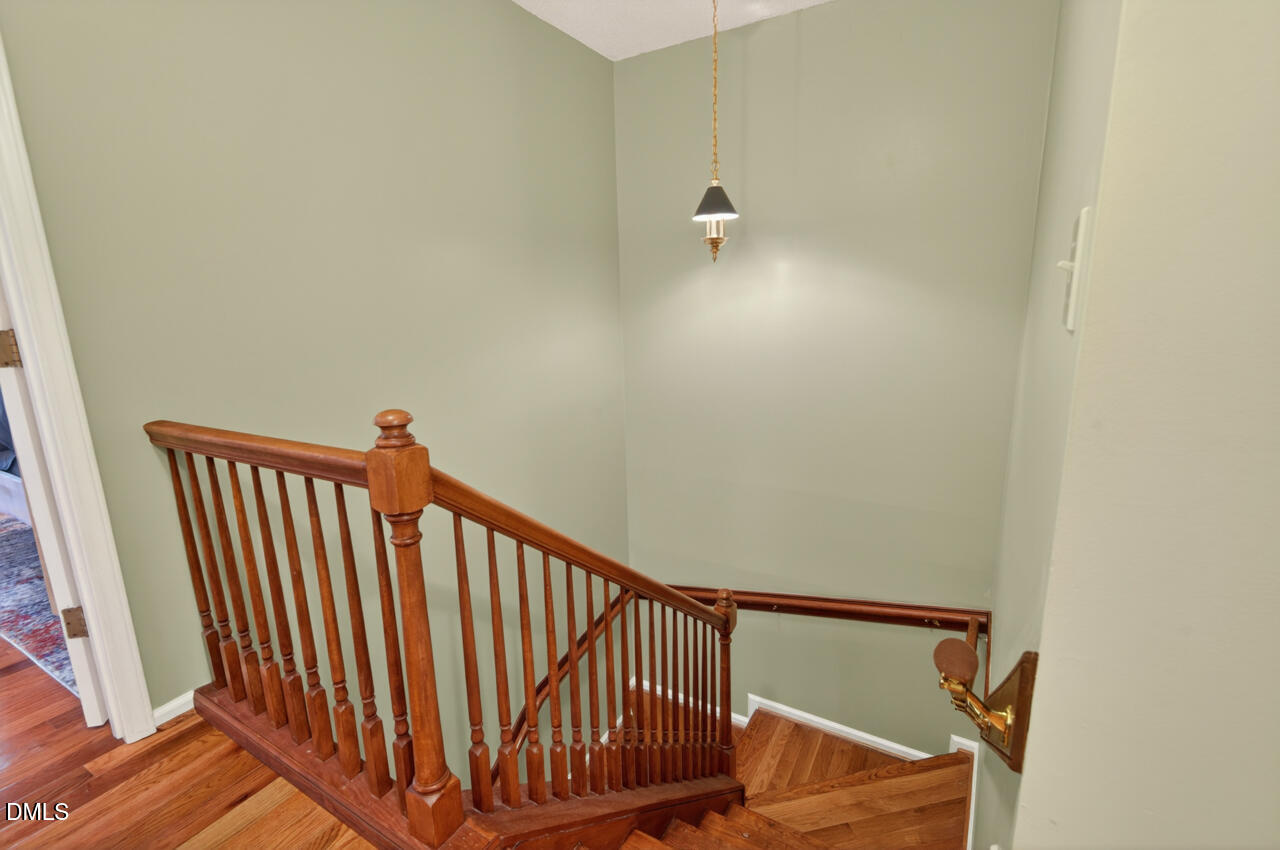 3307 Coachman's Way Durham, NC 27705 - Photo 28 of 50 a view of a staircase with wooden floor