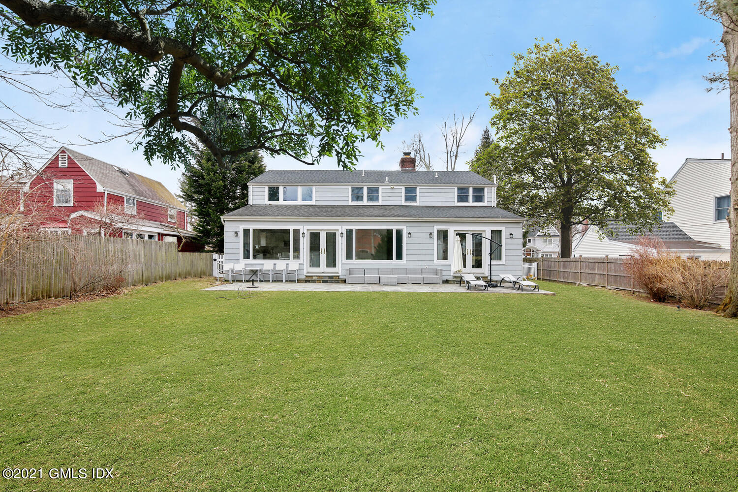 65 Summit Road Riverside, CT 06878 - Photo 16 of 20 a front view of a house with a garden
