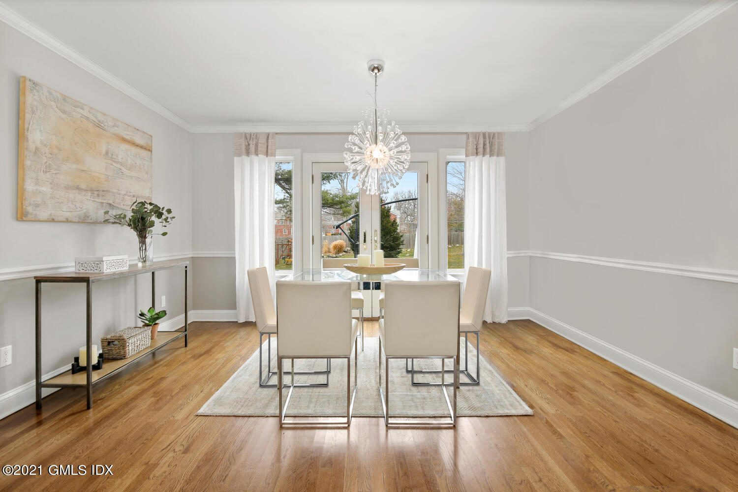 65 Summit Road Riverside, CT 06878 - Photo 4 of 20 a view of a dining room with furniture window and wooden floor