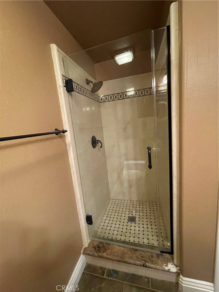 1 Vía Perico Rancho Santa Margarita, CA 92688 - Photo 11 of 22 a bathroom with a shower