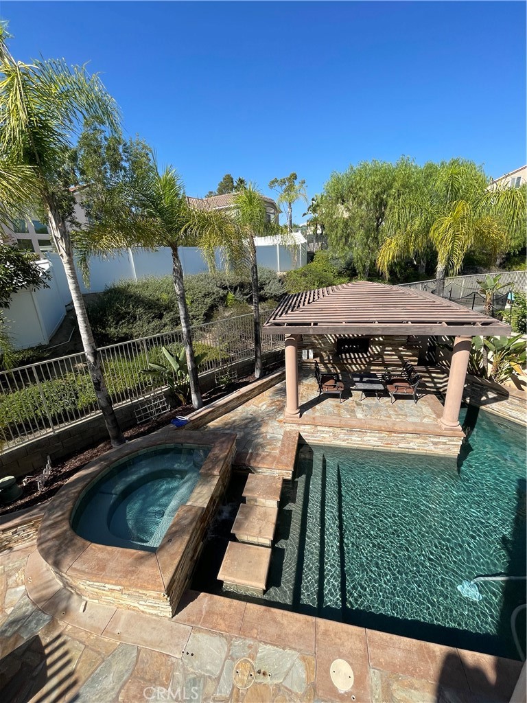 1 Vía Perico Rancho Santa Margarita, CA 92688 - Photo 13 of 22 a view of swimming pool with a back yard