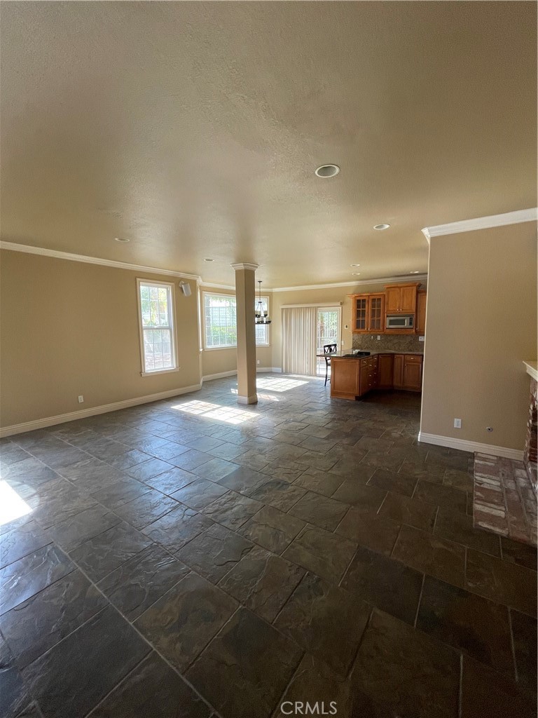 1 Vía Perico Rancho Santa Margarita, CA 92688 - Photo 18 of 22 a living room with furniture and a window