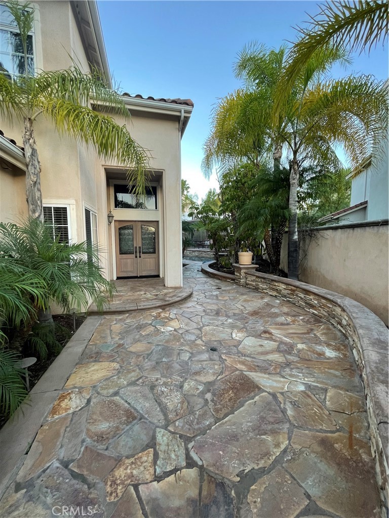 1 Vía Perico Rancho Santa Margarita, CA 92688 - Photo 2 of 22 a view of a house with a yard