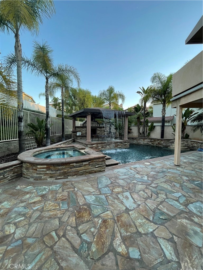 1 Vía Perico Rancho Santa Margarita, CA 92688 - Photo 3 of 22 a swimming pool view with a outdoor seating