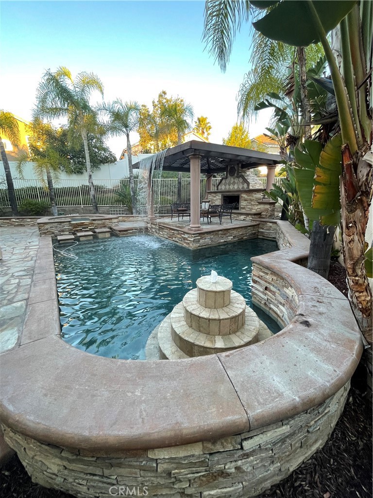 1 Vía Perico Rancho Santa Margarita, CA 92688 - Photo 5 of 22 a view of a house with a yard