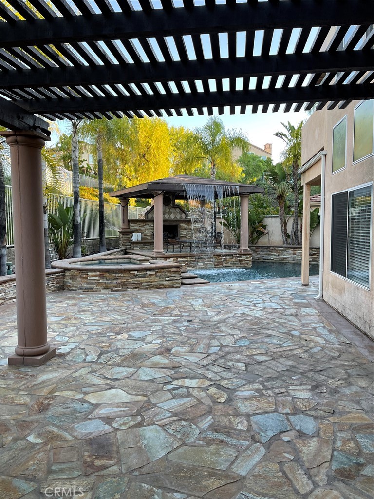 1 Vía Perico Rancho Santa Margarita, CA 92688 - Photo 7 of 22 a porch with view of outdoor space