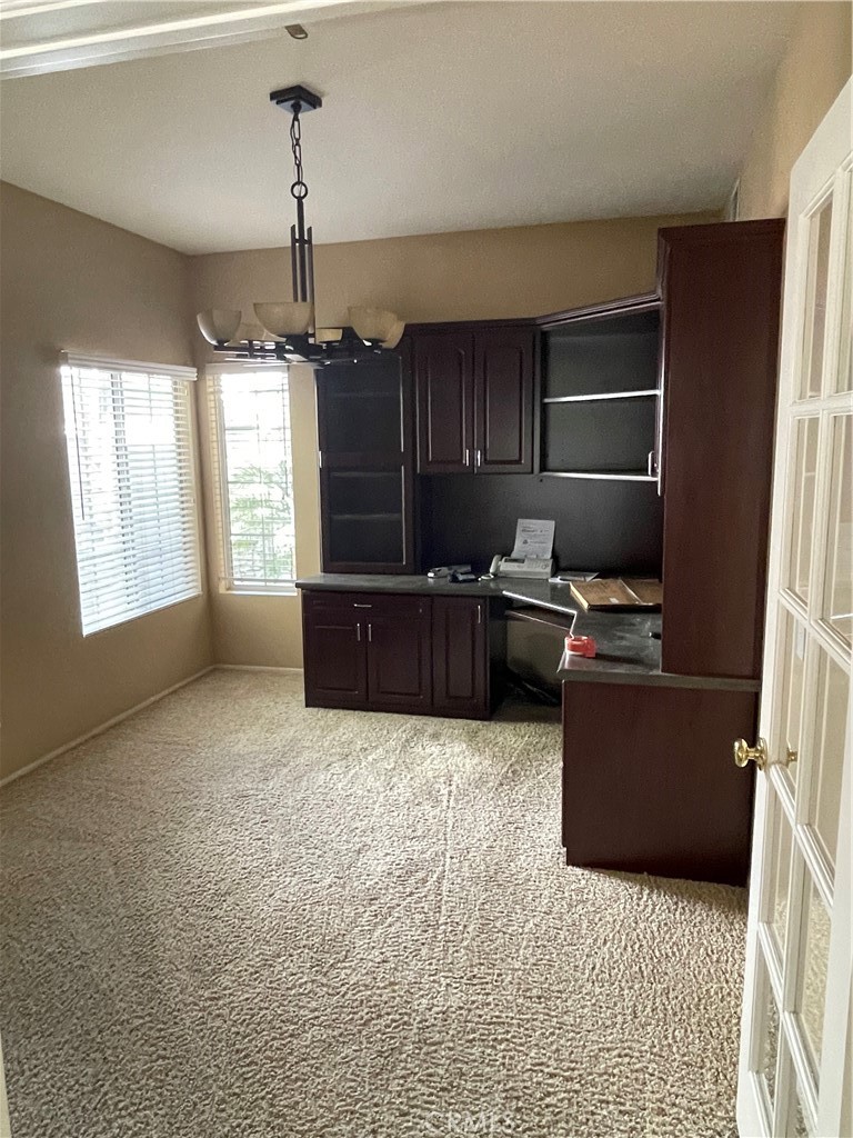 1 Vía Perico Rancho Santa Margarita, CA 92688 - Photo 9 of 22 a living room with furniture and a window