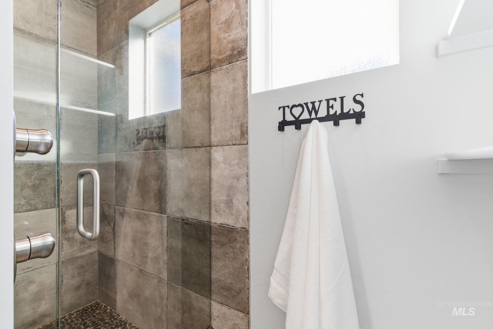 1013 East Radiant Ridge Drive Meridian, ID 83642 - Photo 25 of 36 Bathroom with a shower stall