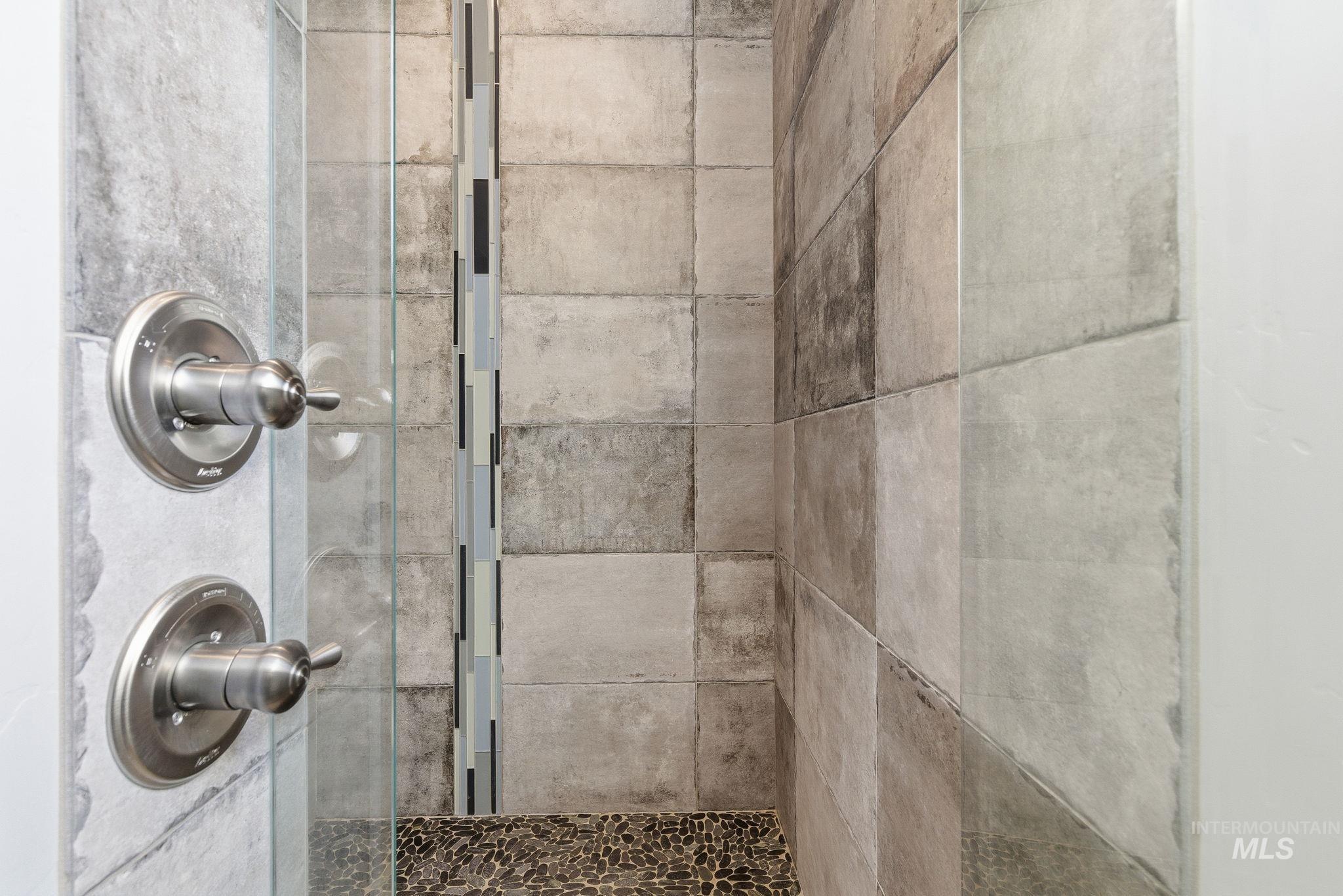 1013 East Radiant Ridge Drive Meridian, ID 83642 - Photo 26 of 36 Bathroom view of a shower stall