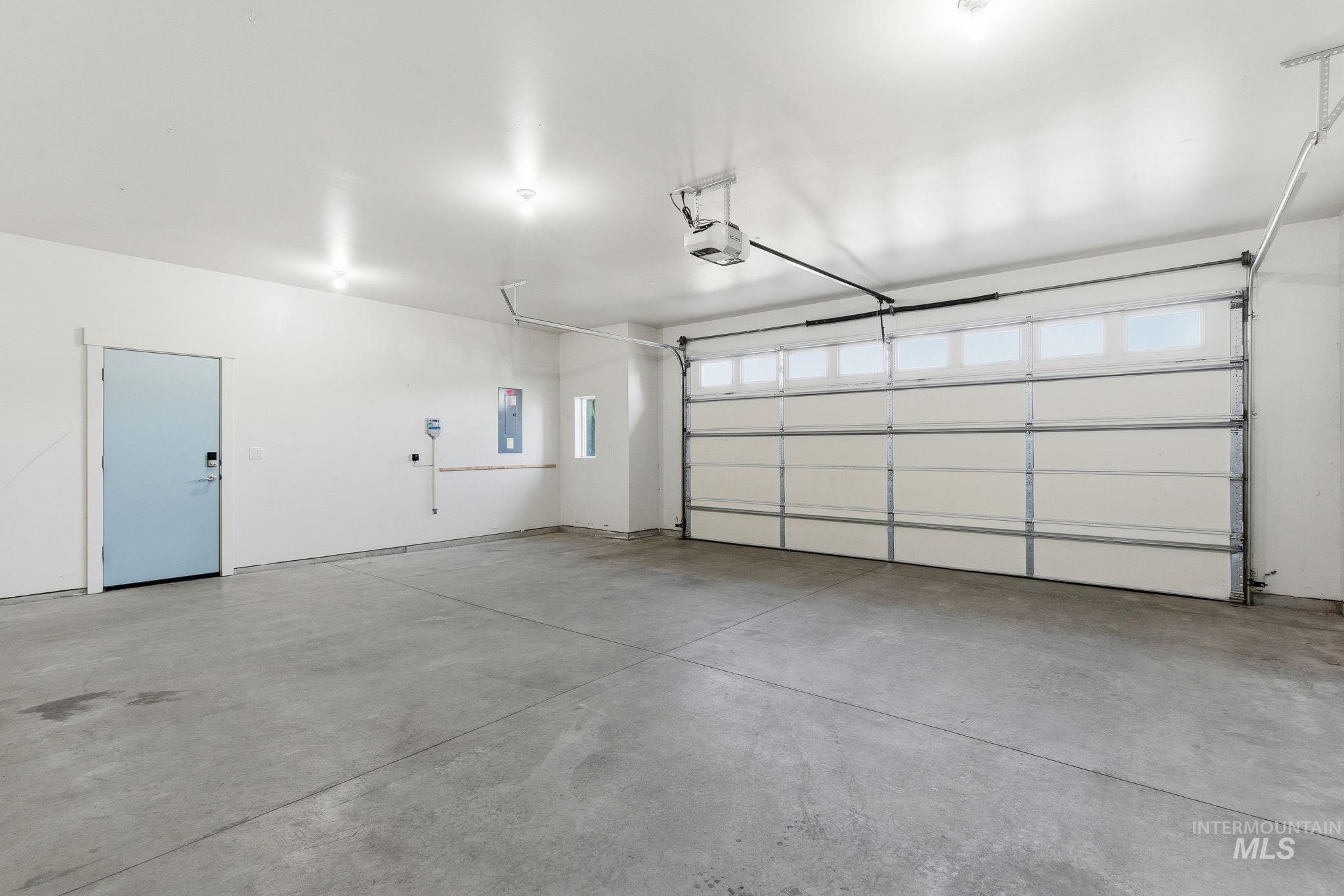 1013 East Radiant Ridge Drive Meridian, ID 83642 - Photo 28 of 36 Garage featuring electric panel