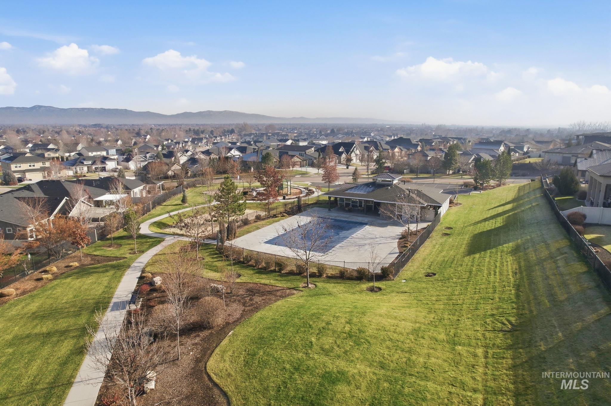1013 East Radiant Ridge Drive Meridian, ID 83642 - Photo 35 of 36 Aerial view of residential area featuring a mountain backdrop