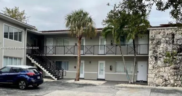 a car parked in front of a building