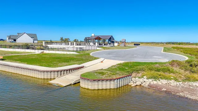 a view of a swimming pool with an ocean view