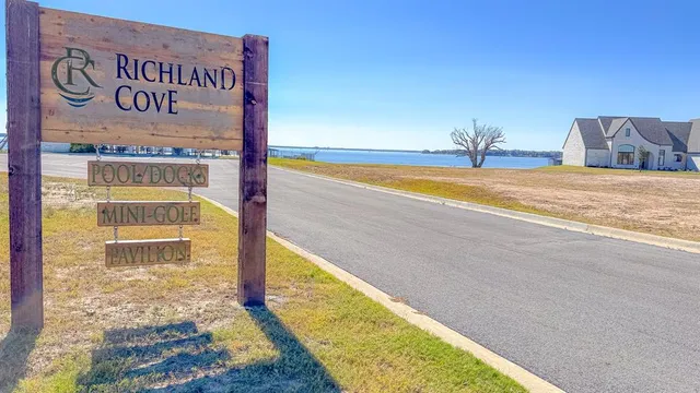 a view of swimming pool with a yard