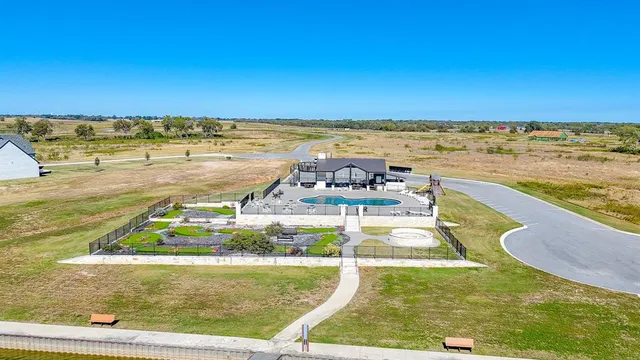 a view of a swimming pool with an ocean view