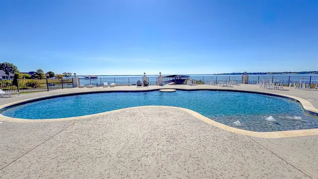 a view of a swimming pool and an ocean