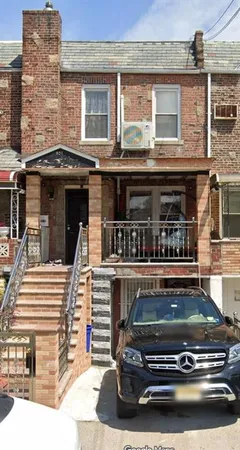 a car parked in front of a building