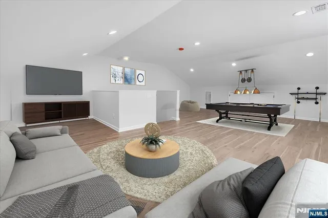 a living room with furniture and a couch