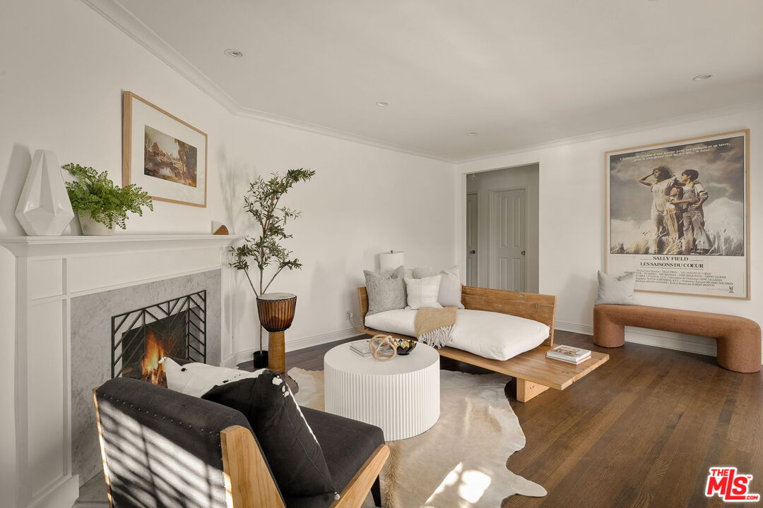 1209 Appleton Way Venice, CA 90291 - Photo 11 of 46 a living room with furniture and a fireplace