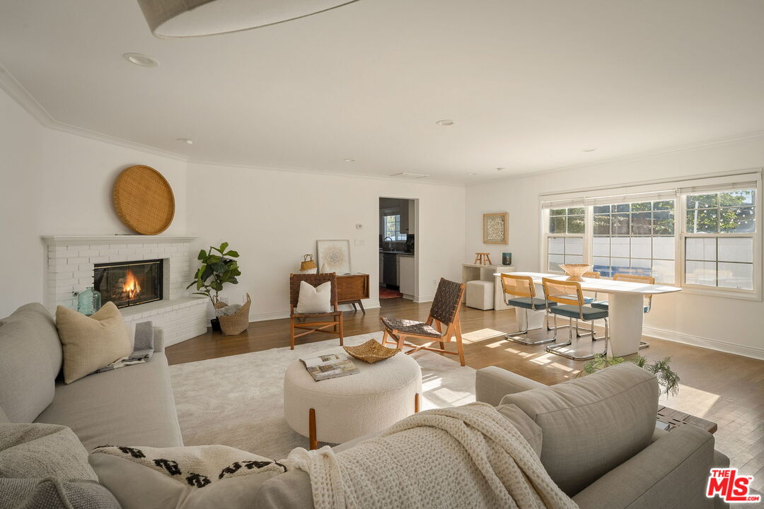 1209 Appleton Way Venice, CA 90291 - Photo 23 of 46 a living room with furniture a fireplace a large window and a large window