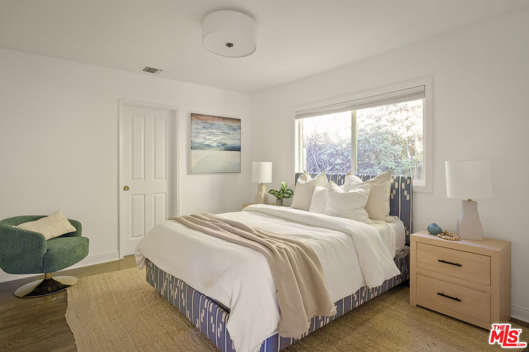 1209 Appleton Way Venice, CA 90291 - Photo 25 of 46 a bedroom with a bed and a window