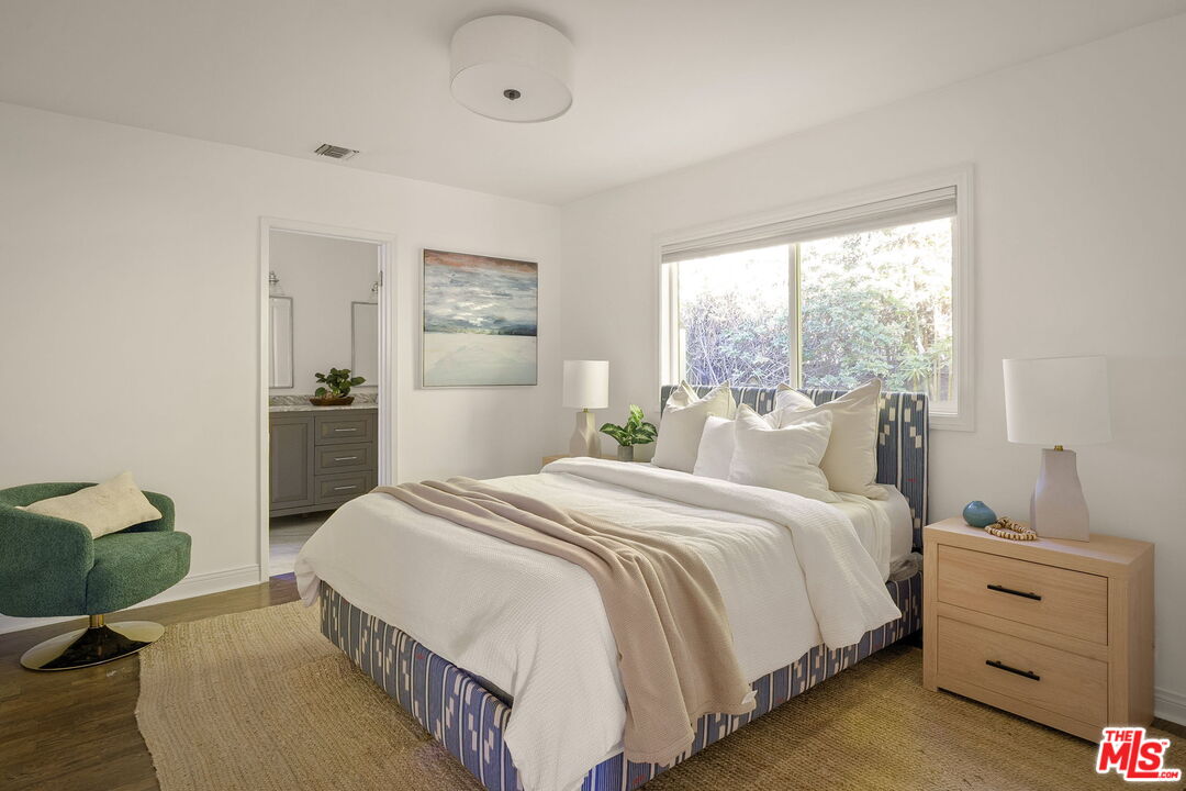 1209 Appleton Way Venice, CA 90291 - Photo 26 of 46 a bedroom with a bed and a window