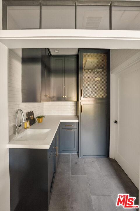 1209 Appleton Way Venice, CA 90291 - Photo 44 of 46 a kitchen with a sink and a refrigerator
