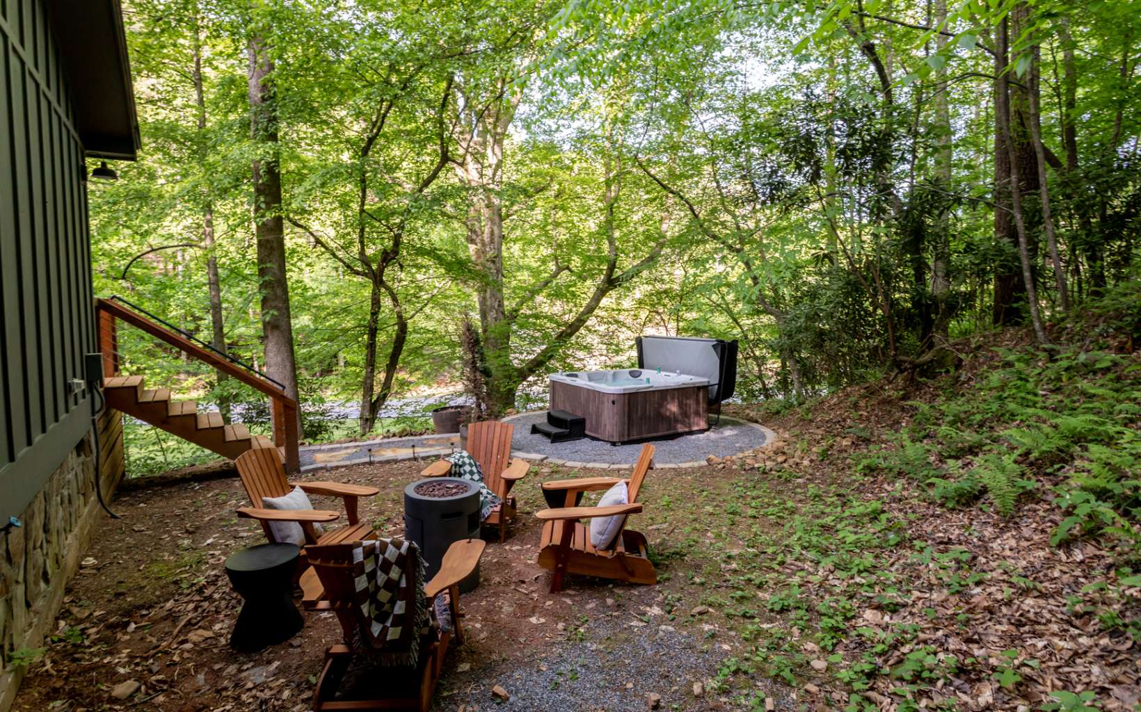 2000 Aska Road Blue Ridge, GA 30513 - Photo 21 of 22 a backyard of a house with table and chairs
