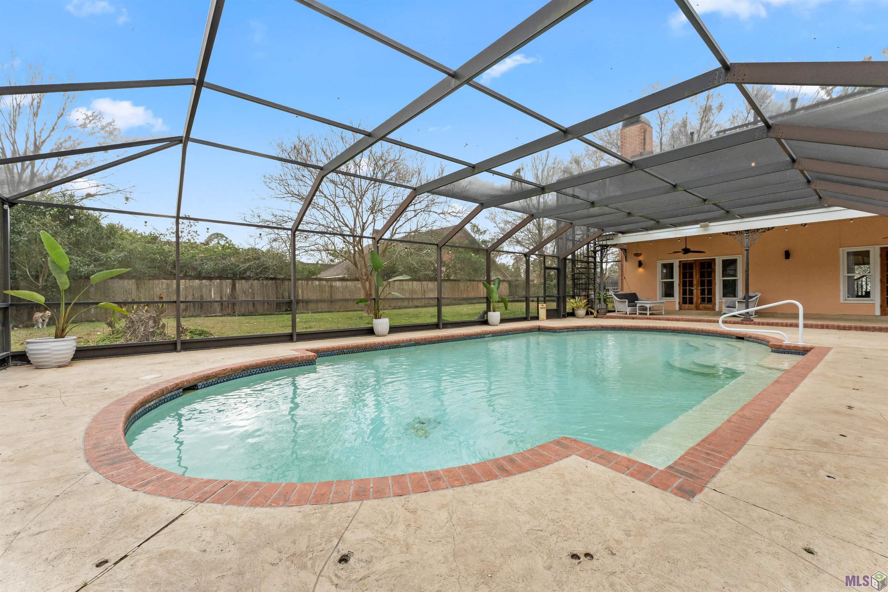 5743 Belle Grove Avenue Baton Rouge, LA 70820 - Photo 30 of 39 Screen covered pool