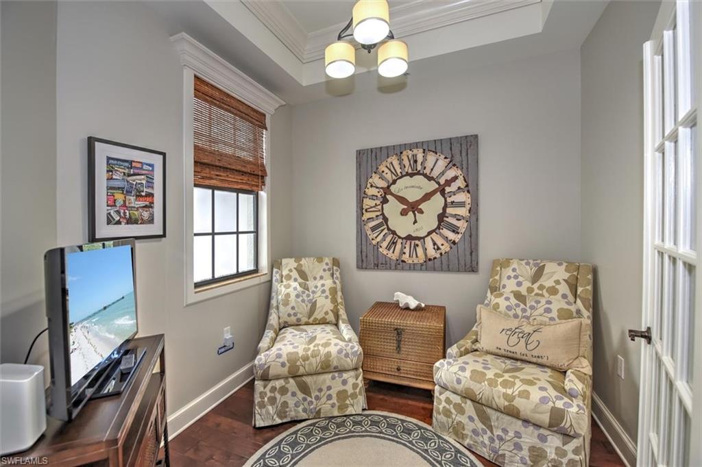 555 5th Avenue South, Unit PH1 Naples, FL 34102 - Photo 13 of 31 a living room with furniture and a window