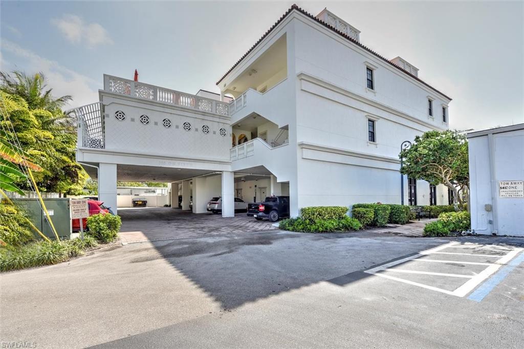 555 5th Avenue South, Unit PH1 Naples, FL 34102 - Photo 2 of 31 a view of a building with a street