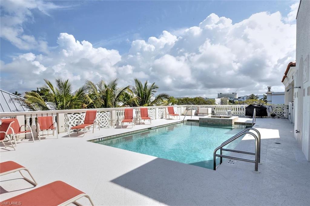 555 5th Avenue South, Unit PH1 Naples, FL 34102 - Photo 25 of 31 swimming pool view with a outdoor seating