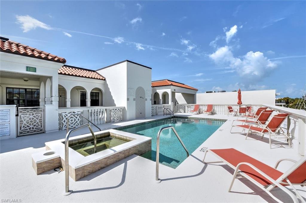 555 5th Avenue South, Unit PH1 Naples, FL 34102 - Photo 26 of 31 a building outdoor space with patio furniture