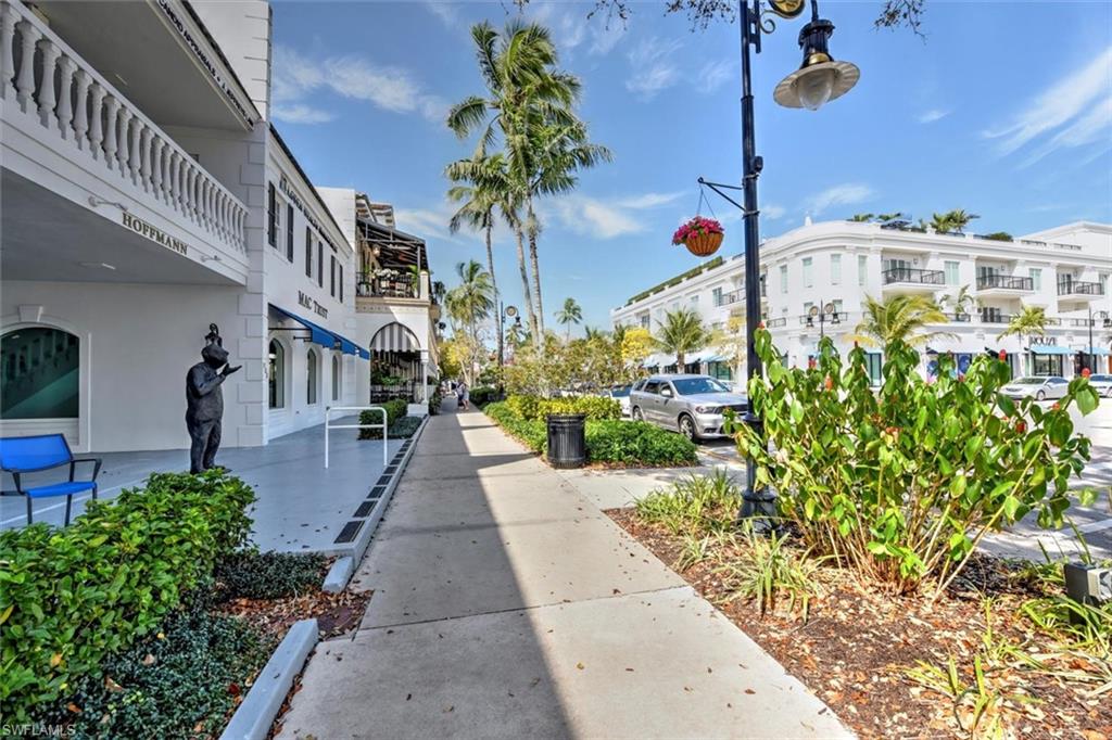 555 5th Avenue South, Unit PH1 Naples, FL 34102 - Photo 29 of 31 a view of a street with potted plants