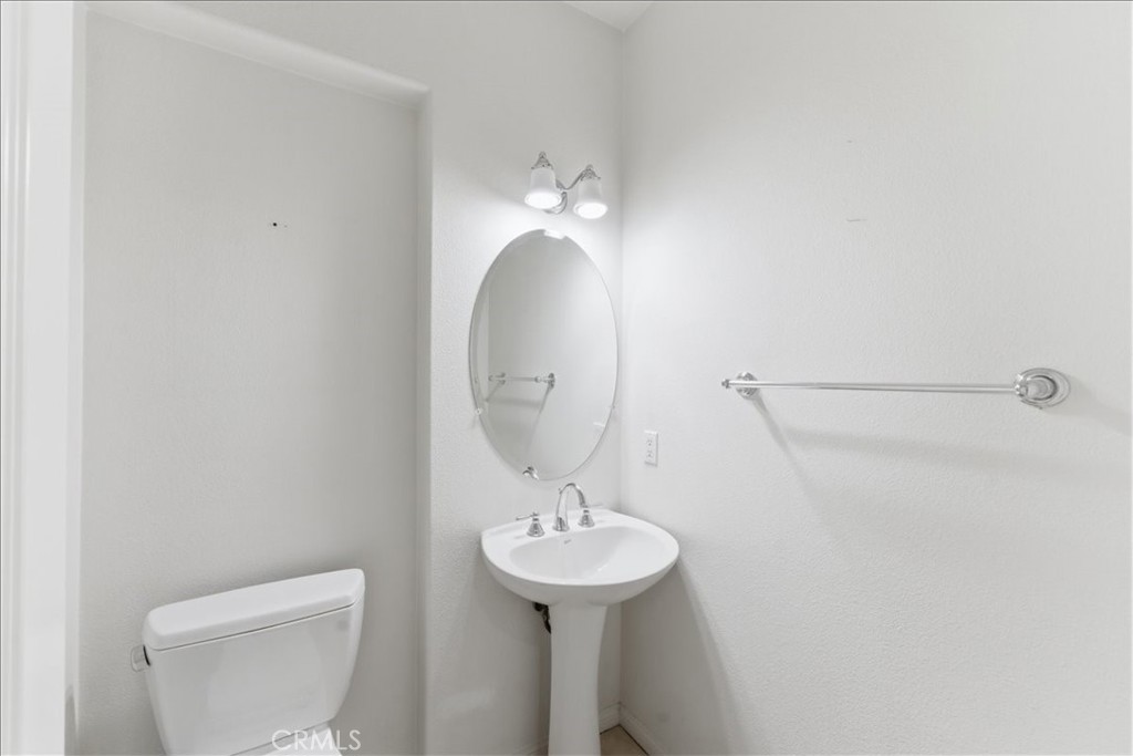 480 Santa Maria Street Anaheim, CA 92801 - Photo 14 of 17 a bathroom with a sink and mirror